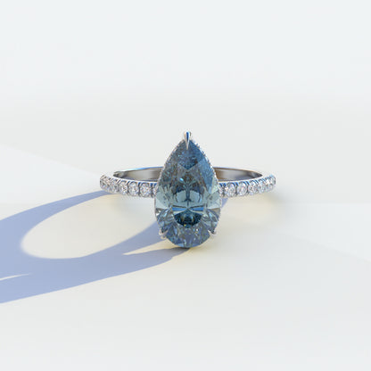 2 carat blue pear cut lab-grown diamond, blue hidden halo pave ring, lab-grown diamond engagement ring, ethical blue diamond ring, pear cut engagement ring