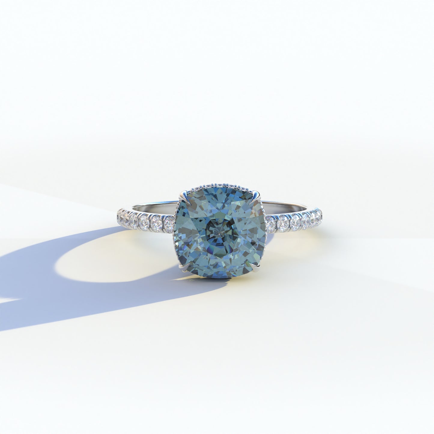 3 carat blue cushion cut lab-grown diamond, blue hidden halo ring, pave diamond engagement ring, lab-grown diamond engagement ring, ethical blue diamond ring