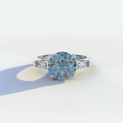 2.5 carat blue round and tapered cut multi stone lab diamond ring, Reflection Collection, sustainable elegant jewelry, engagement ring, high-quality diamond ring, lab-grown diamond ring