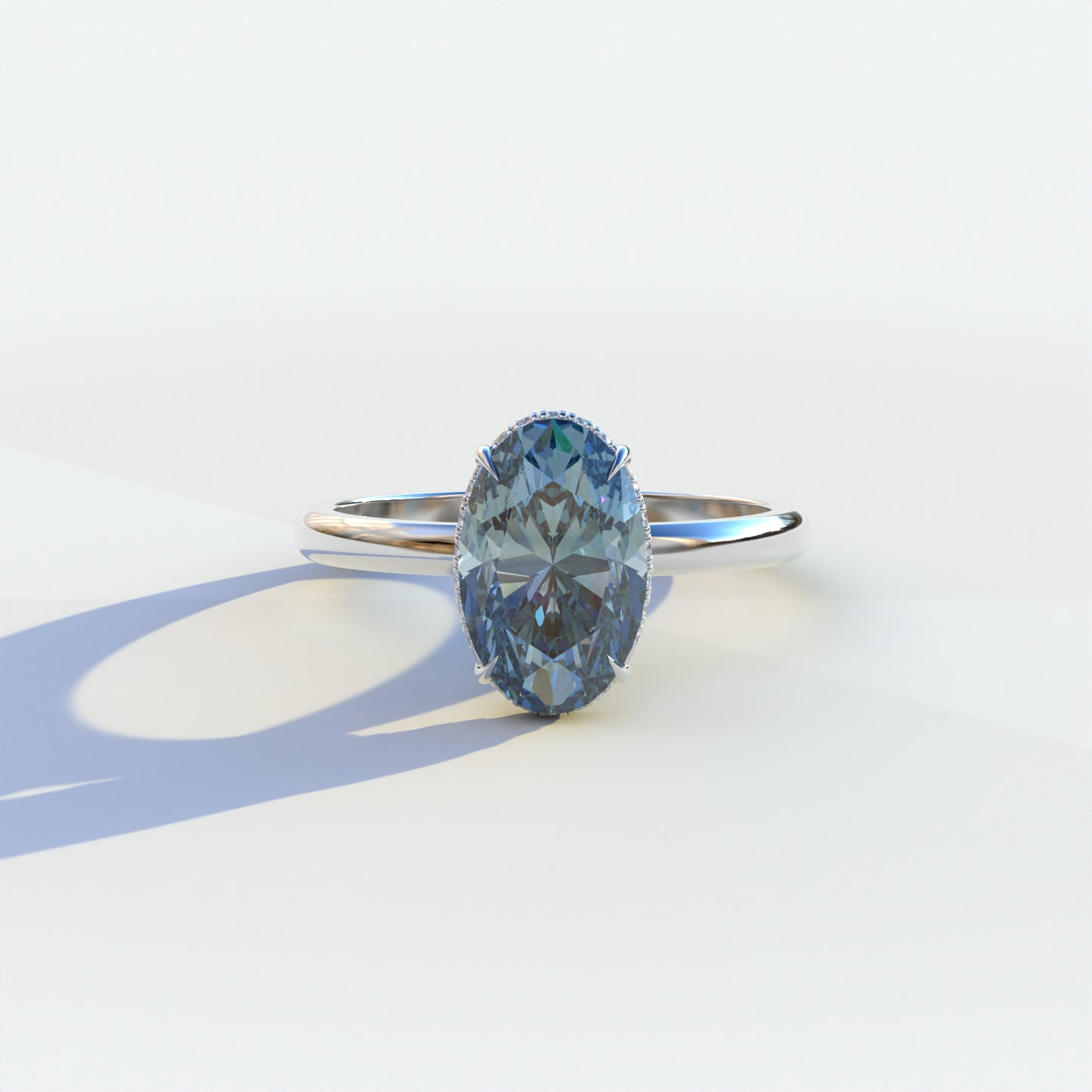 2.5 carat blue oval cut hidden halo lab diamond ring, Mi Amor Collection, sustainable elegant jewelry, engagement ring, high-quality diamond ring, lab-grown diamond ring